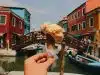 person holding ice cream cone