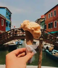 person holding ice cream cone