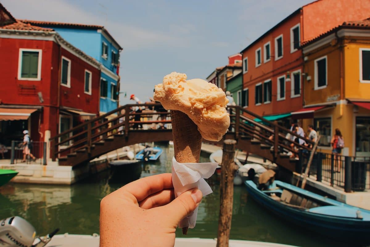 person holding ice cream cone